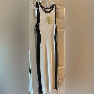 Ribbed, heavy weight Michael Kors dressed. Never worn! Shin length, beautiful!